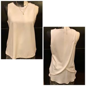 White sleeveless top with layered back -never worn